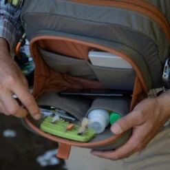 Fishpond Cross Current Chest Pack 11 Fishpond Cross Current Chest Pack -Orvis Shop crosscurrent flybench open